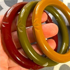 Matched set of Carved Bakelite Bangles